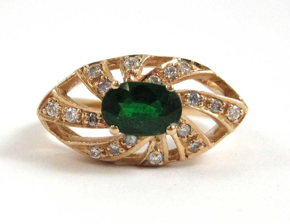 Appraisal: TSAVORITE DIAMOND AND FOURTEEN KARAT GOLD RING with round-cut diamonds