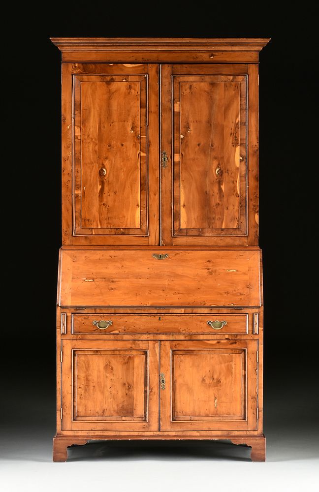 Appraisal: A GEORGE III STYLE YEW WOOD SLANT FRONT SECRETARY BOOKCASE