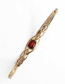 Appraisal: A ct gold garnet set bangle inner diameter approximately mm