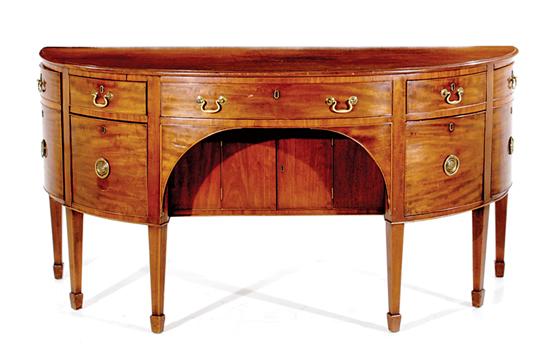 Appraisal: English Hepplewhite mahogany bowfront sideboard circa shaped top over conforming