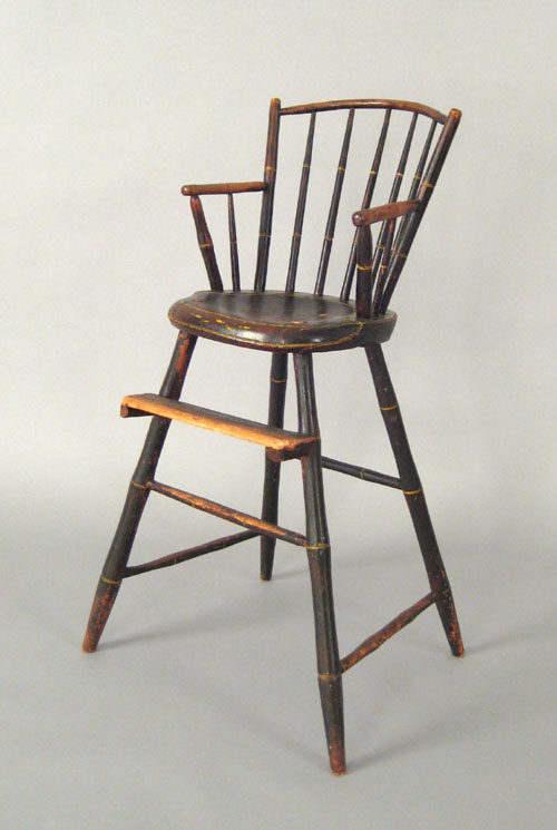 Appraisal: Pennsylvania windsor highchair ca retaining an old black surface with