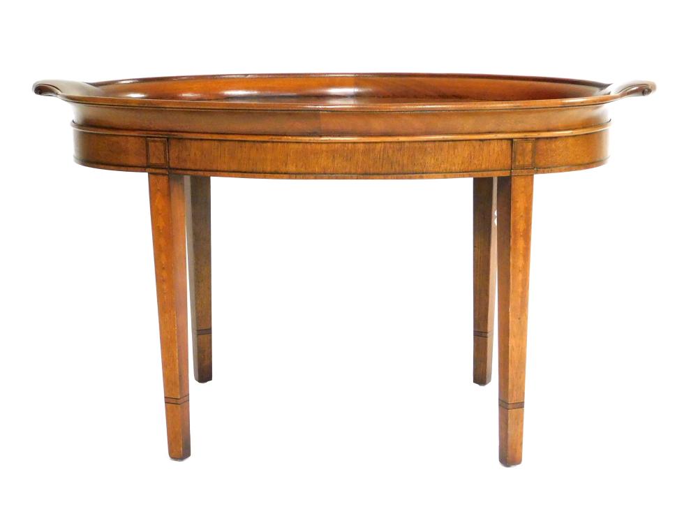 Appraisal: Wellington Hall oval coffee table Federal style mahogany attached tray