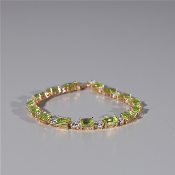 Appraisal: Sterling silver bracelet with fifteen peridots weighing approx cts total