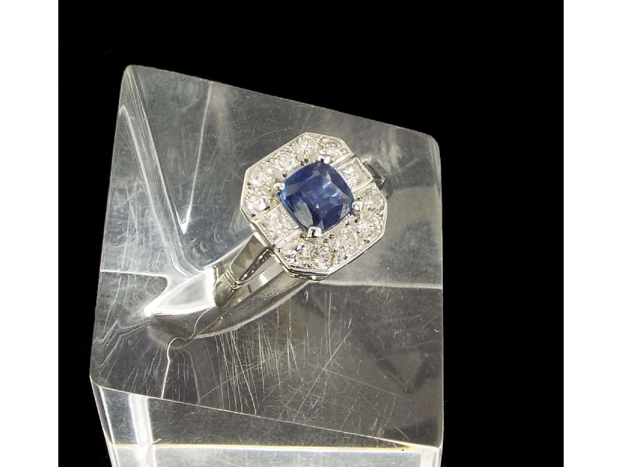 Appraisal: ct white gold sapphire and diamond cushion-cut cluster ring the