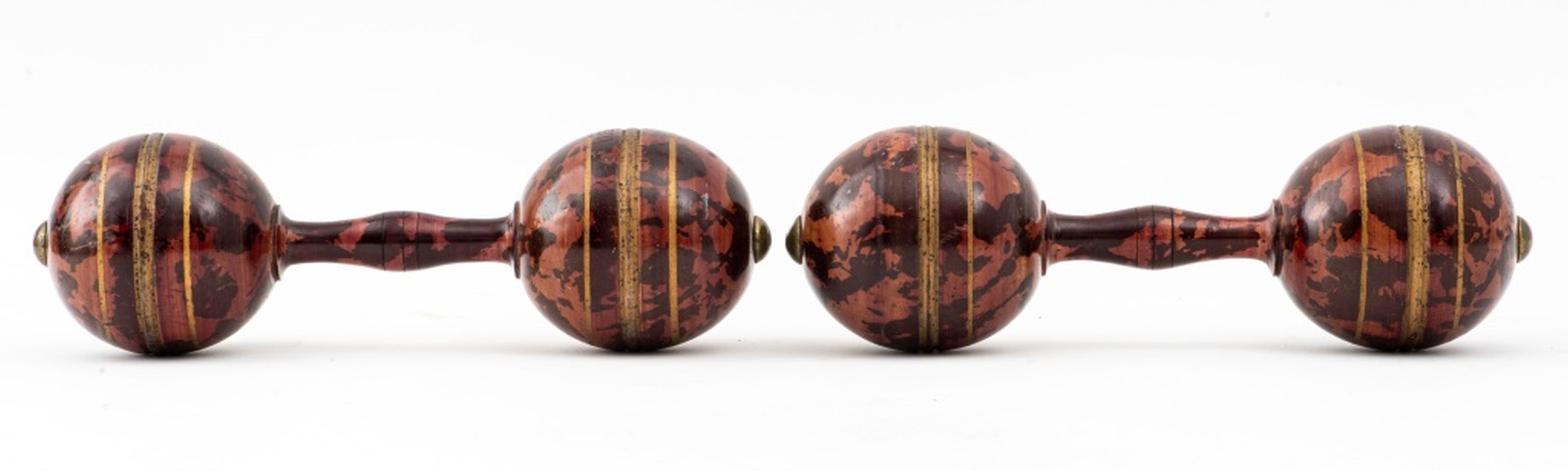 Appraisal: PAINTED WOODEN DUMBBELLS PAIR Pair of painted wooden dumbbells to