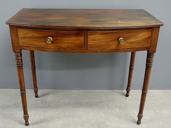 Appraisal: - English Sheraton bow-front two-drawer table c h x w