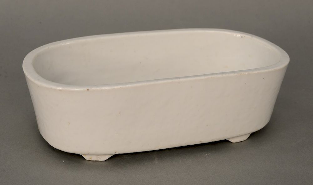 Appraisal: White monochrome footed bowl China th th century of elliptical