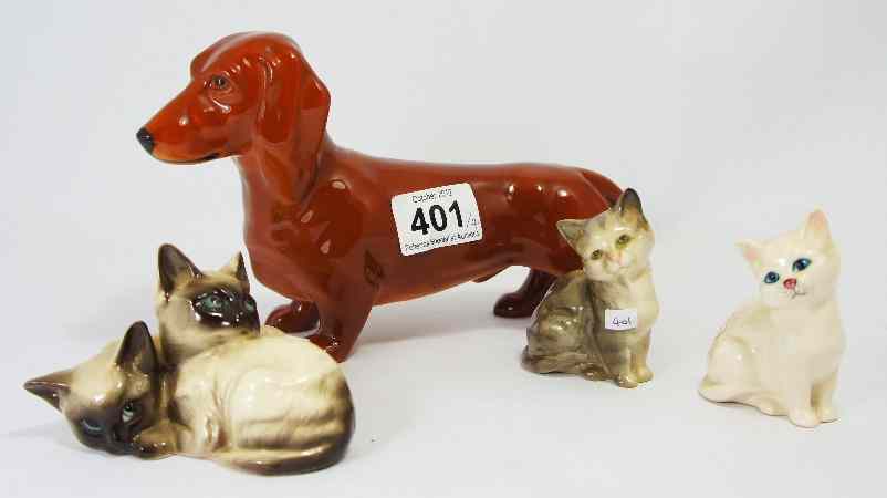 Appraisal: Beswick Tan Dachshund Pair Siamese Kittens grey Kitten seated and