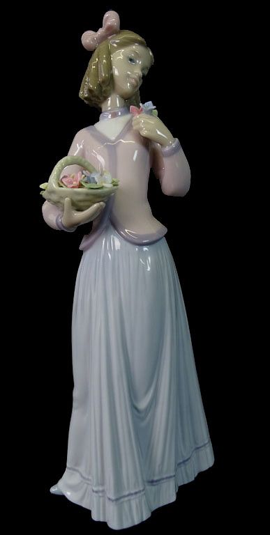 Appraisal: Lladro Innocence in Bloom Porcelain Lladro Innocence in Bloom Porcelain