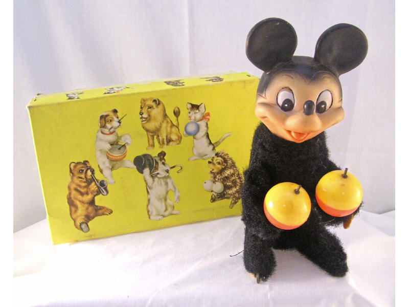 Appraisal: Morrocan Playing Mechanical Mouse Rubber faced Mickey style mouse in