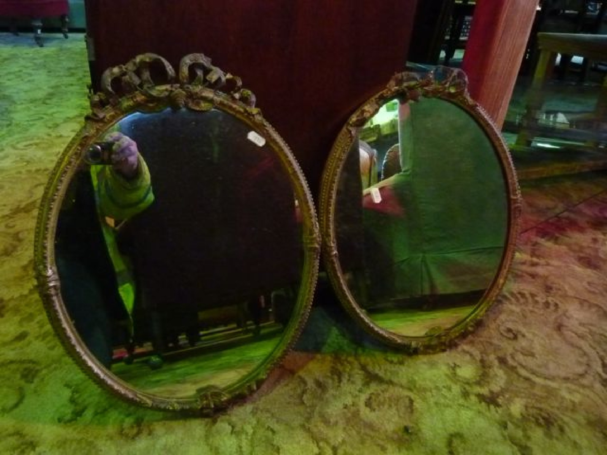 Appraisal: A pair of small th century gilt framed wall mirrors