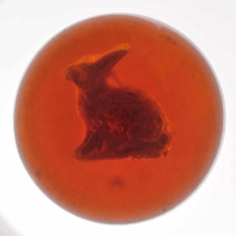 Appraisal: Amber Rabbit Sulphide Marble Description Root beer amber sulphide with