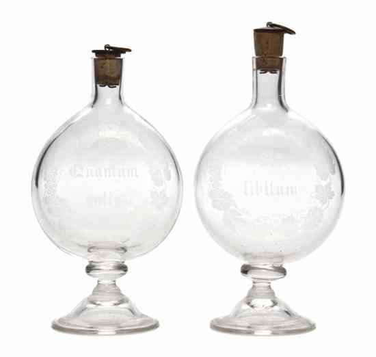 Appraisal: A Pair of Etched Glass Apothecary Bottles likely th century