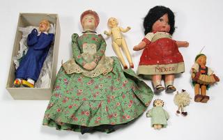 Appraisal: lot of approx International dolls executed in ceramic papier-mache wood