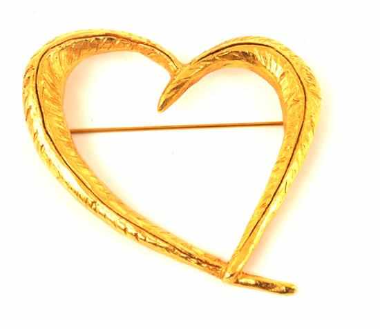 Appraisal: A HEART BROOCH BY CHRISTIAN LACROIX Styled in gilt metal