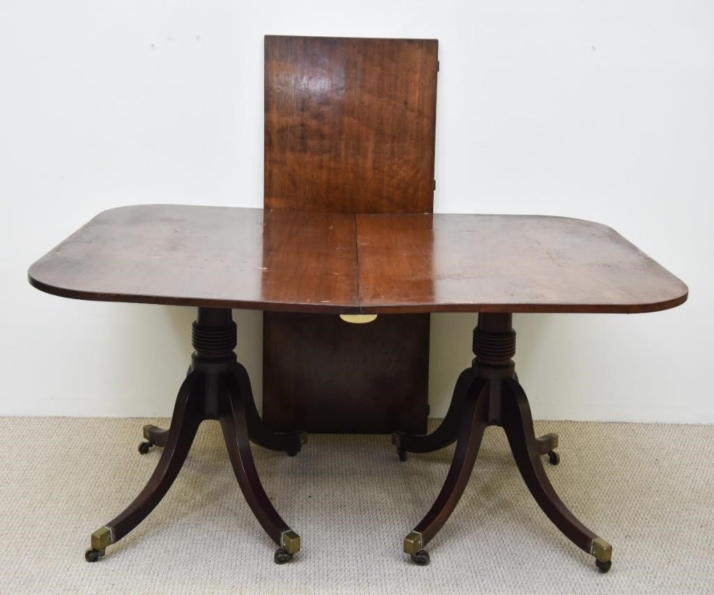 Appraisal: Regency mahogany double pedestal dining table early th c with