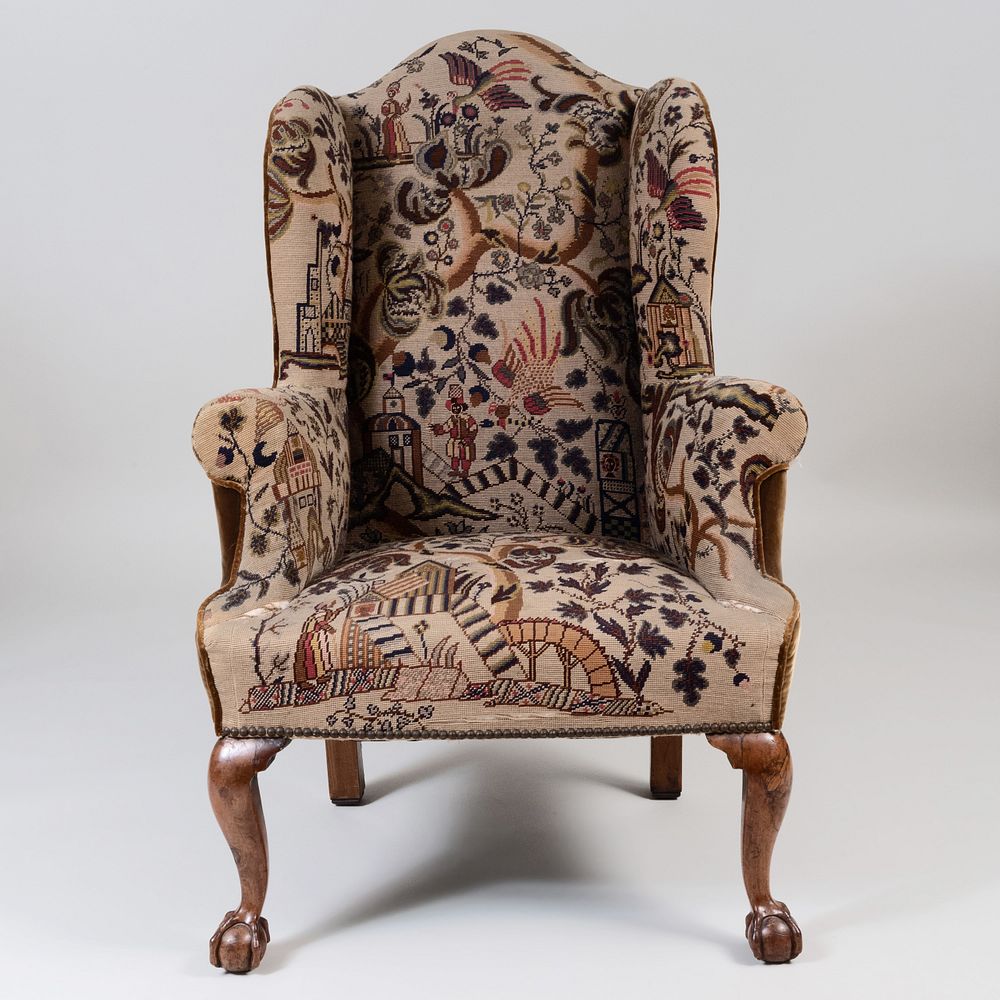 Appraisal: George II Walnut Wing Chair Upholstered in figural needlework and