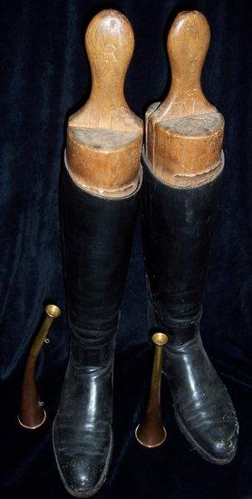 Appraisal: A pair of black riding boots with trees and two