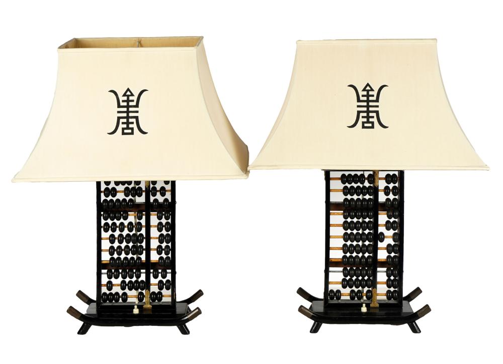 Appraisal: PAIR OF ABACUS-FORM WOODEN LAMPSeach with printed with linen shade