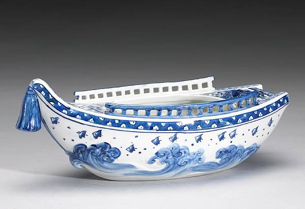 Appraisal: A blue and white porcelain model of a boat Possibly