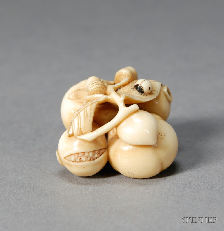 Appraisal: Ivory Netsuke th century study of persimmons acorns and a