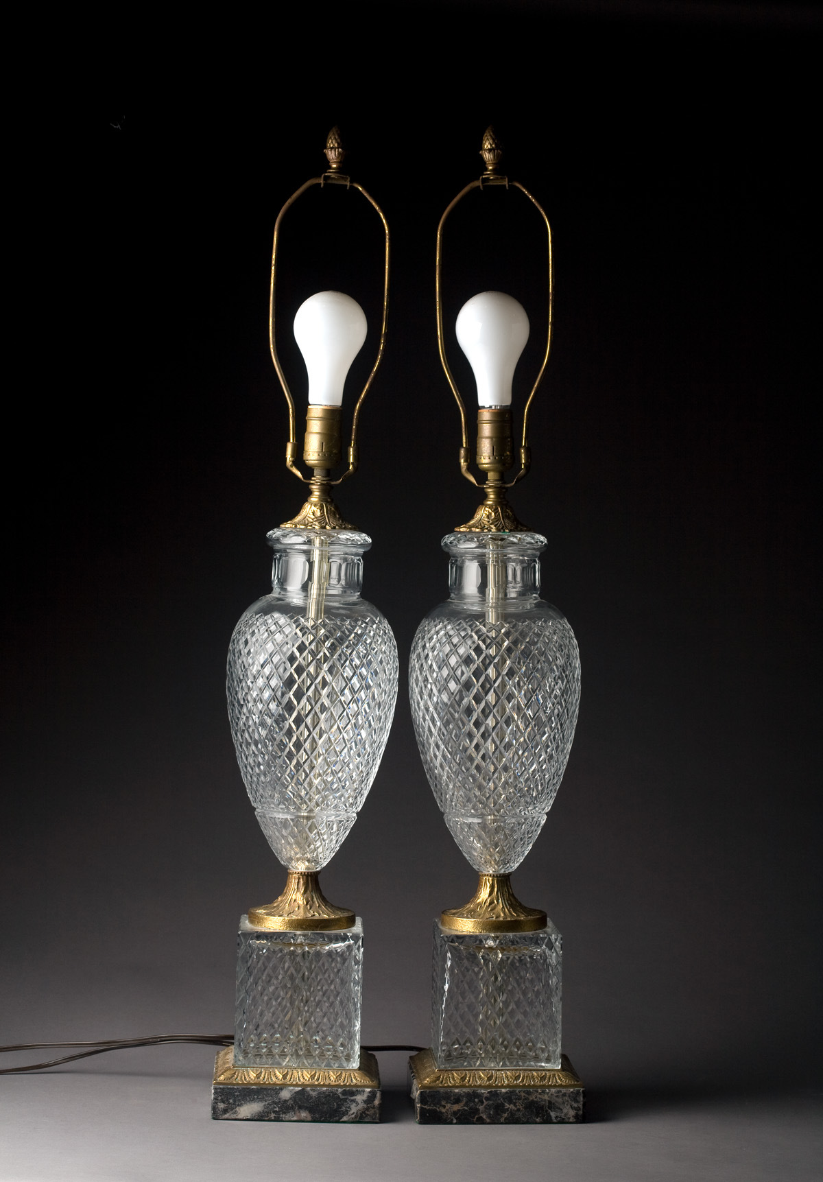 Appraisal: PAIR OF CONTEMPORARY CUT GLASS AND BRASS TABLE LAMPS WITH