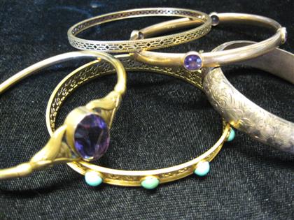 Appraisal: Group of five yellow gold and gold filled bangle bracelets