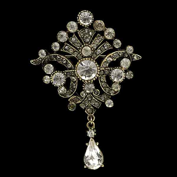 Appraisal: Art Brooch An Art brooch with a faux pearl and