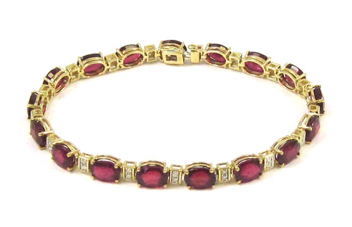 Appraisal: RUBY DIAMOND AND TEN KARAT GOLD BRACELET - inches in