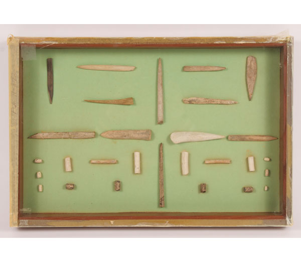 Appraisal: Frame of bone and shell awls and bead Artifacts from