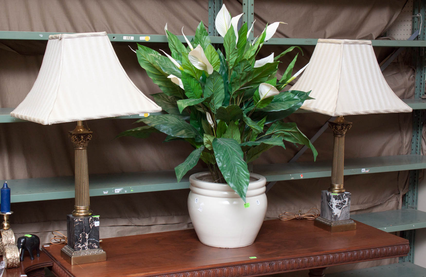 Appraisal: Pair of columnar table lamps and a planter