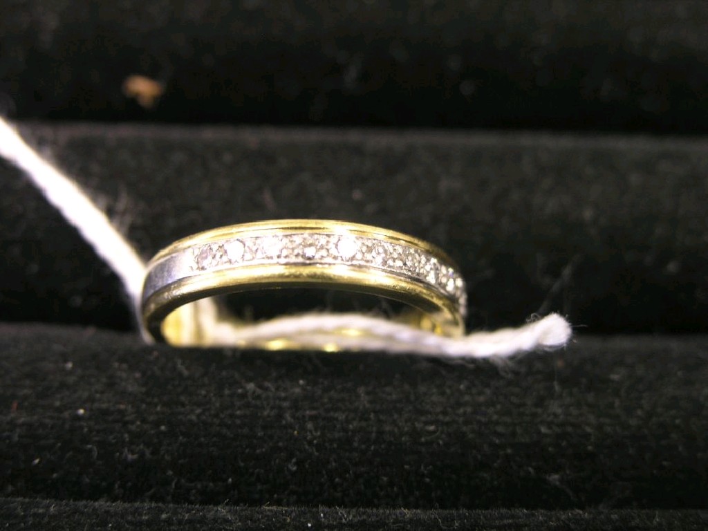 Appraisal: An ct gold half eternity ring set numerous small diamonds