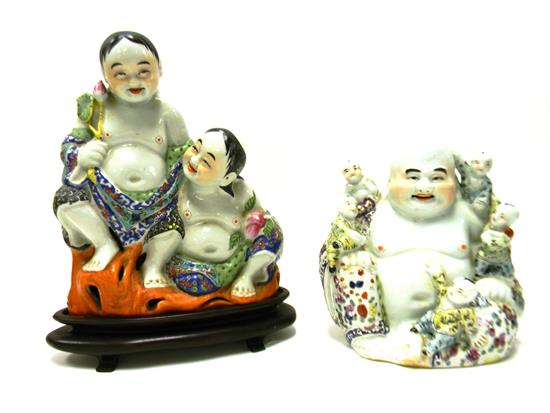 Appraisal: ASIAN Two th C Chinese porcelain figures of Asian deities