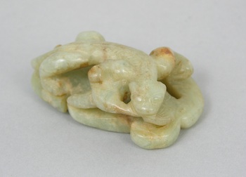 Appraisal: A Pale Green Chinese Carved Jade Dragon A pale green