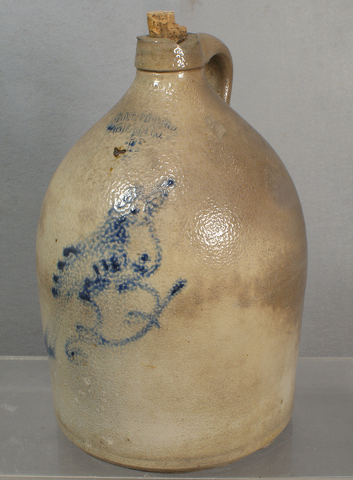 Appraisal: gal blue bird decorated stoneware jug large chip on spout