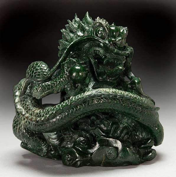 Appraisal: Maw-sit-sit Carving The Dragon Designed by Ronald Stevens Presently called