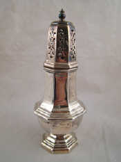 Appraisal: An octagonal silver caster in the Georgian style London ht