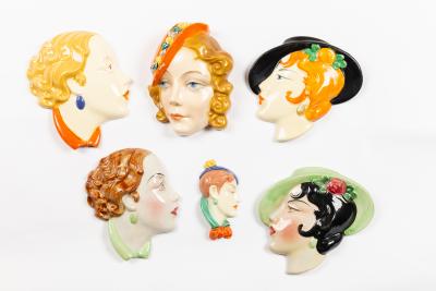 Appraisal: A group of Czechoslovakian wall masks ladies' faces in the