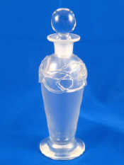 Appraisal: Liberty A tall baluster glass scent bottle with trailed overlay