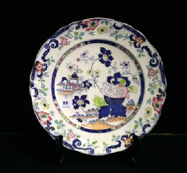 Appraisal: An ironstone plate together with a Staffordshire blue and white