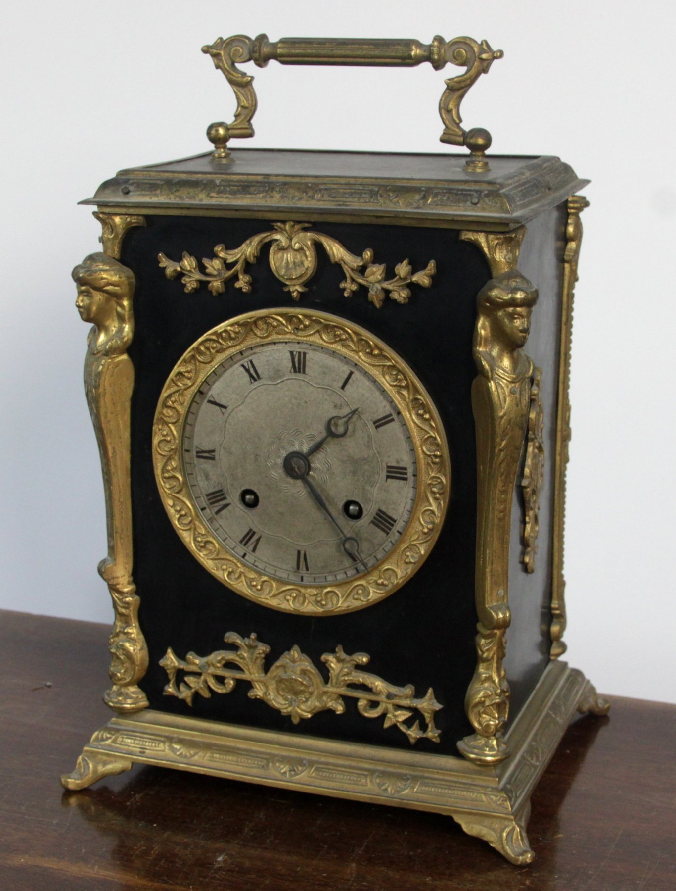 Appraisal: A French mantel clock the silvered dial with Roman numerals