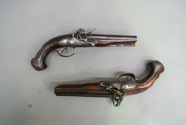 Appraisal: A pair of French double barrel flintlock pistols caliber inch