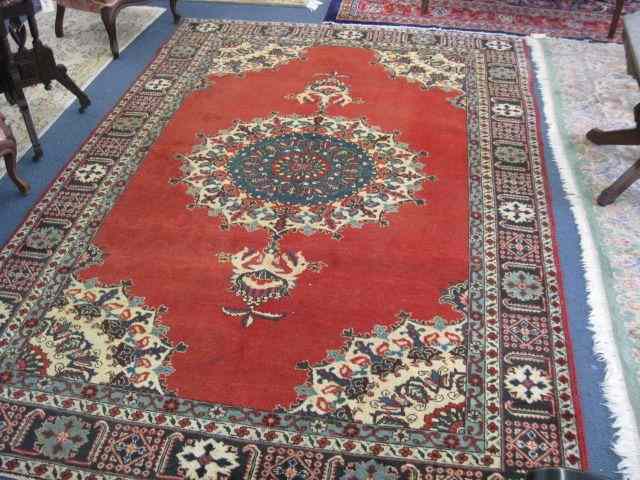 Appraisal: Tabriz Persian Handmade Rug central medallion red field ' ''