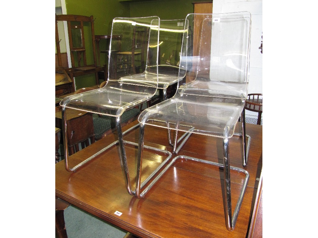 Appraisal: Set of four th Century perspex and tubular chrome chairs