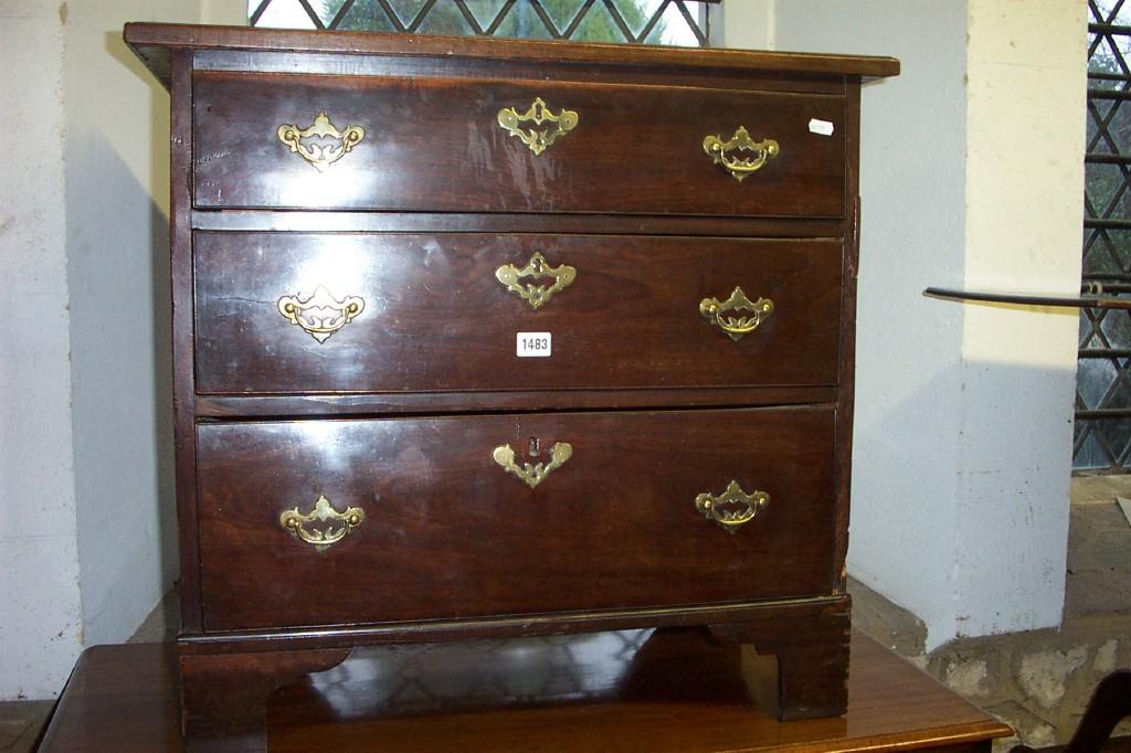 Appraisal: A Georgian mahogany and pine chest of long graduated drawers