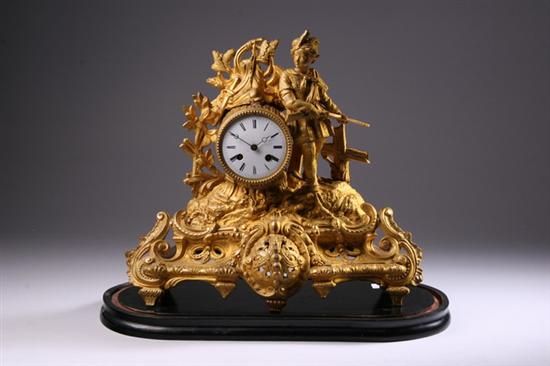 Appraisal: VICTORIAN GILT METAL FIGURAL MANTEL CLOCK Mid- th century Depicting