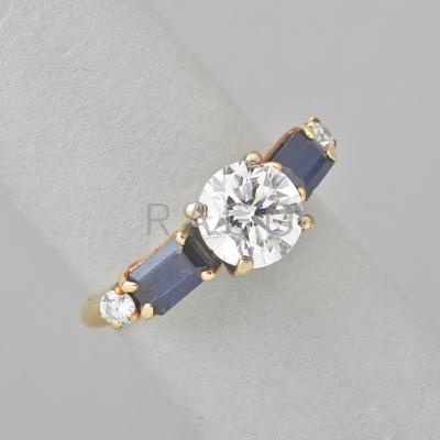 Appraisal: DIAMOND AND SAPPHIRE K YELLOW GOLD RING Circular brilliant cut