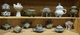 Appraisal: Group of Chinese Archaistic Vessels lot of Two shelves of