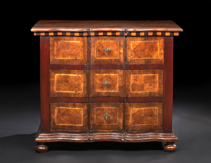 Appraisal: Italian Walnut Commode the rectangular top with serpentine front edge