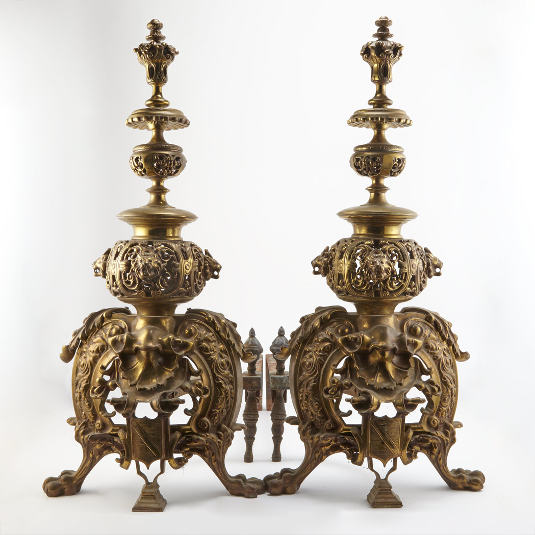 Appraisal: Pair of Renaissance Style Gilt-Metal Andirons Each decorated with lion